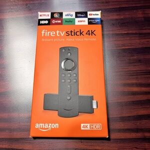 Fire TV Stick 4K - Orange and Black Packaging Amazon GUC